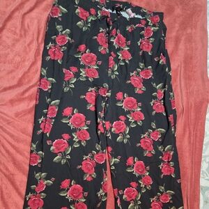Torrid Black Pants with Red Floral Design